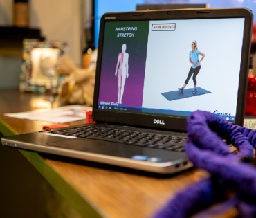MyCurves On Demand on Laptop Screen with Resistance Band